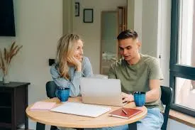 Glass of water next to handwritten notes